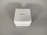 the box is white and has a black logo on it