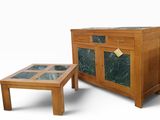 a wooden cabinet and a table with a glass top