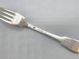 a fork that is sitting on a table