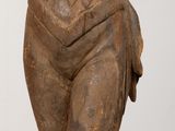 an image of a statue of a woman with a hat on her head