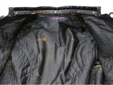 an image of a black jacket with a hole in the back