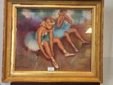 une photo d'un tableau représentant deux ballerines, posé sur un chevalet