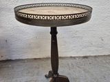 a small table that is sitting on the ground