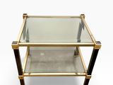 a brass and glass coffee table