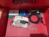 a red tool box with a bunch of tools in it