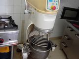 an image of a kitchen with a mixer and a stove