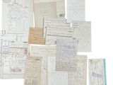 several old papers are piled together on top of each other