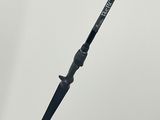a close up of a fishing rod on a white background