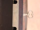 a close up of a metal object with a hole in the middle of it