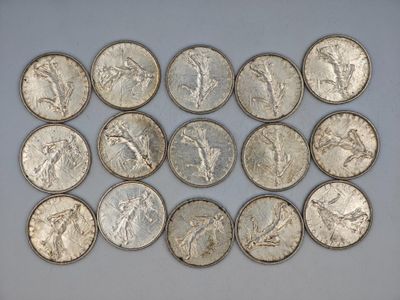 a close up of a bunch of coins on a table