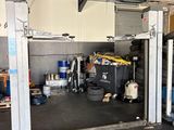 an image of a garage with a lot of tools