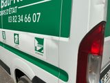 a van that is parked on the side of the road