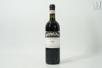 a bottle of wine that is sitting on a table