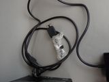 a computer mouse and a charger connected to a laptop