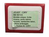 red and white business card holder with name and address