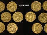 the gold coins are arranged in rows on a black surface