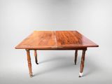 an image of a wooden table with two legs and a wooden top