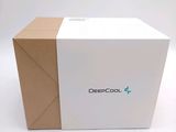 a white box with a logo on it sitting on a white surface