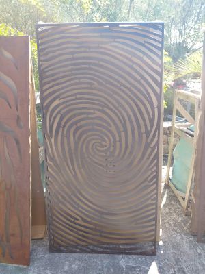three different types of wood panels sitting on the ground