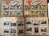 a lot of stamps on the pages of a book