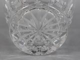a close up of a clear glass bowl on a table