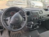 the interior of a car with a steering wheel and dashboard controls