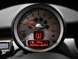 a close up of a car dashboard with a speedometer