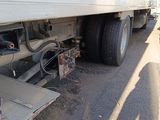 a truck that is parked on the side of the road