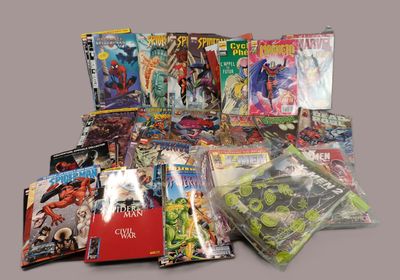 a lot of comic books that are on the table