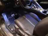 a picture of a car with a blue light in it