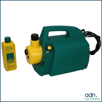 a green and yellow pump and a bottle of liquid
