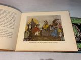 an open book with a picture of a group of people on it