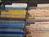 a lot of folders that are sitting in a box