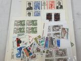 many different stamps on a piece of paper on a table