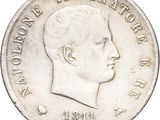 Gros plan sur une pièce de monnaie portant le visage d'un homme