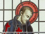 a stained glass picture of a man with a beard