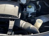 a car engine with the hood open and the hood down