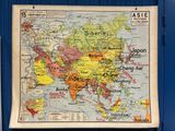 map of asia on a bulletin board in a blue wall