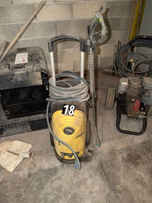 an image of a vacuum and other tools in a room