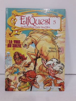un livre sur lequel figurent l'image d'un cheval et d'autres personnages