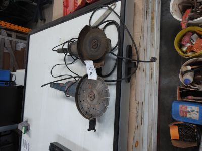 a refrigerator that has a bunch of tools on it