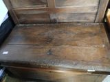 a wooden bench that has been cleaned and is sitting in a room
