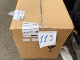 a cardboard box that is sitting on the ground