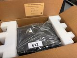 a cardboard box with a black shirt inside of it
