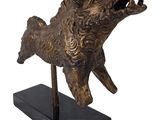 bronze sculpture of a boar on a marble base on a white background