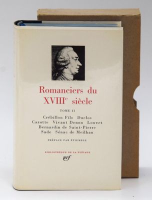 an open book with a picture of a man in profile