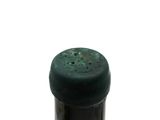 a close up of a bottle of wine on a white background