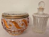 a glass jar and a glass jar sitting next to each other on a table