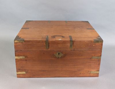 a small wooden box that has a lock on it