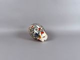 a small animal figurine that is sitting on a table